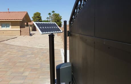 side view of decorative iron security gate run by solar