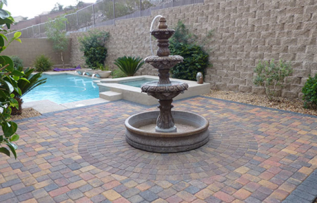 brick stone paver patio and water fountain element