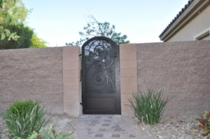 wrought iron entry gate to garden or back yard area