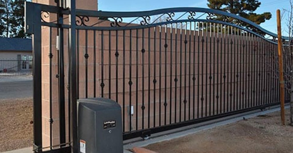 upgrading your entrance gates, custom-designed iron sliding gate at a commercial property, made by J or J Welder in Las Vegas Nevada